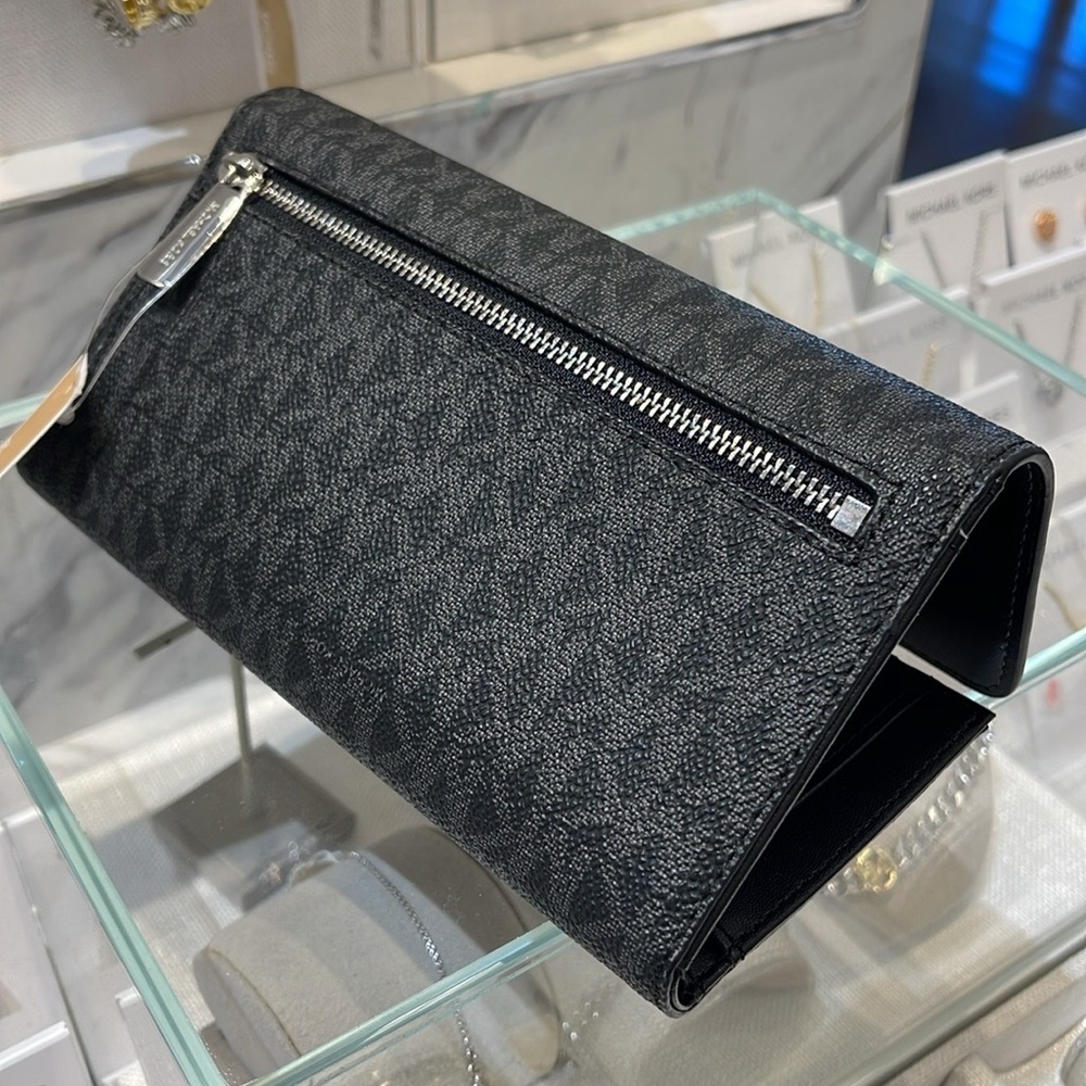 Michael Kors Jet Set Large Signature Logo Tri-Fold Wallet
Black 
NWT - Picture 16 of 16